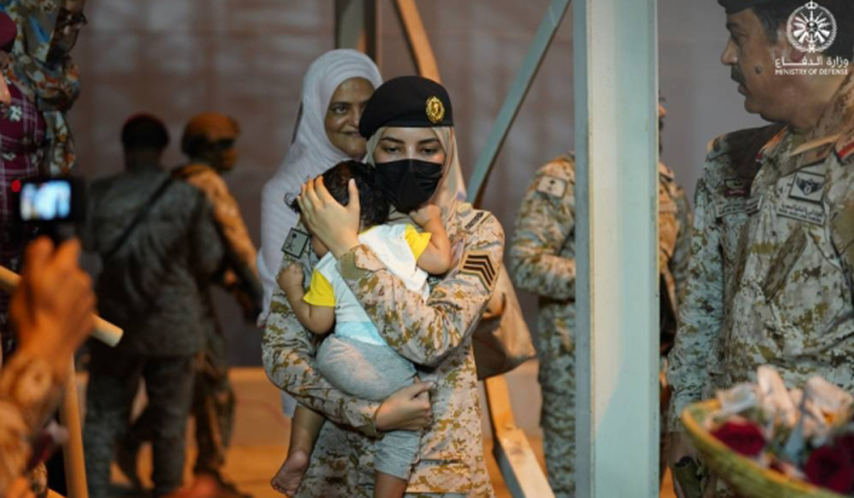 Saudi woman soldier who cradled infant during Sudan evacuation becomes instant hit on social media